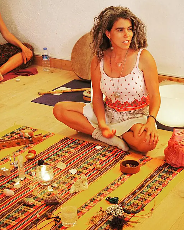 Among crystals and candles, Hande Özerden leads the circle of the power of the word at a full moon sound healing circle in Istanbul.